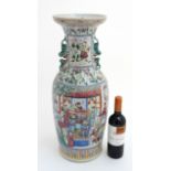A large Chinese Cantonese style famille rose 2 handled baluster floor vase ,
