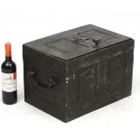 A Victorian cast iron strong box with handles , panelled sides and key.