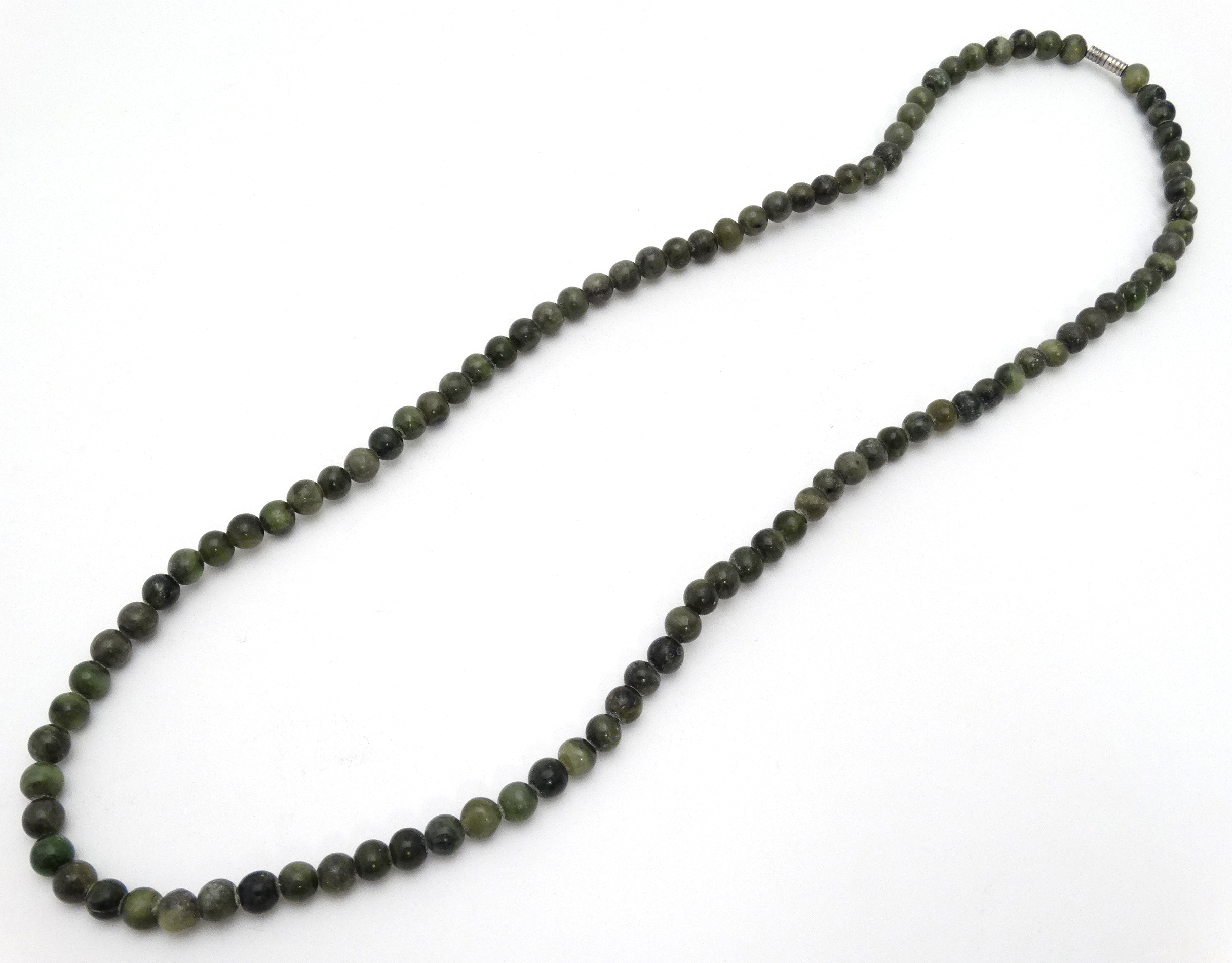 A green hard stone bead necklace approx 30" long CONDITION: Please Note - we do