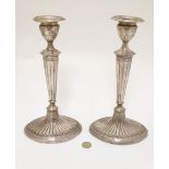 A pair of silver plate candlesticks with fluted decoration 11 1/2" high CONDITION: