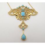 A silver gilt necklace with pendant having seed pearl and turquoise decoration