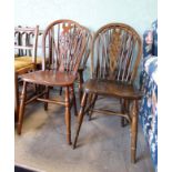 Set of 4 20thC wheel back chairs CONDITION: Please Note - we do not make reference