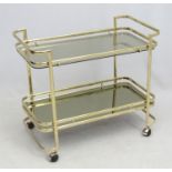 Vintage Retro : an Italian 'Morex' Brass drinks trolley of 2 tiers with smoked glass on castors ,