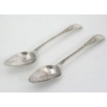 A pair of Geo III silver teaspoons with bright cut decoration hallmarked London 1800 maker Peter