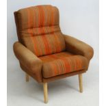 Vintage Retro : A Danish woollen cloth upholstered lounge armchair standing on turned blonde wood