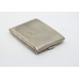 A match box cover with engine turned decoration hallmarked Birmingham 1930 maker Robert Pringle &