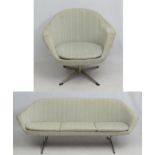Vintage Retro : A Danish Eran style sofa and chair with cloth upholstery on typical H low frame