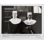 Autograph: Whoopi Goldberg signed black and white photographic print of Whoopi Goldberg and Maggie