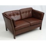 Vintage Retro : A Danish 2 seat sofa chocolate leather , button back ,