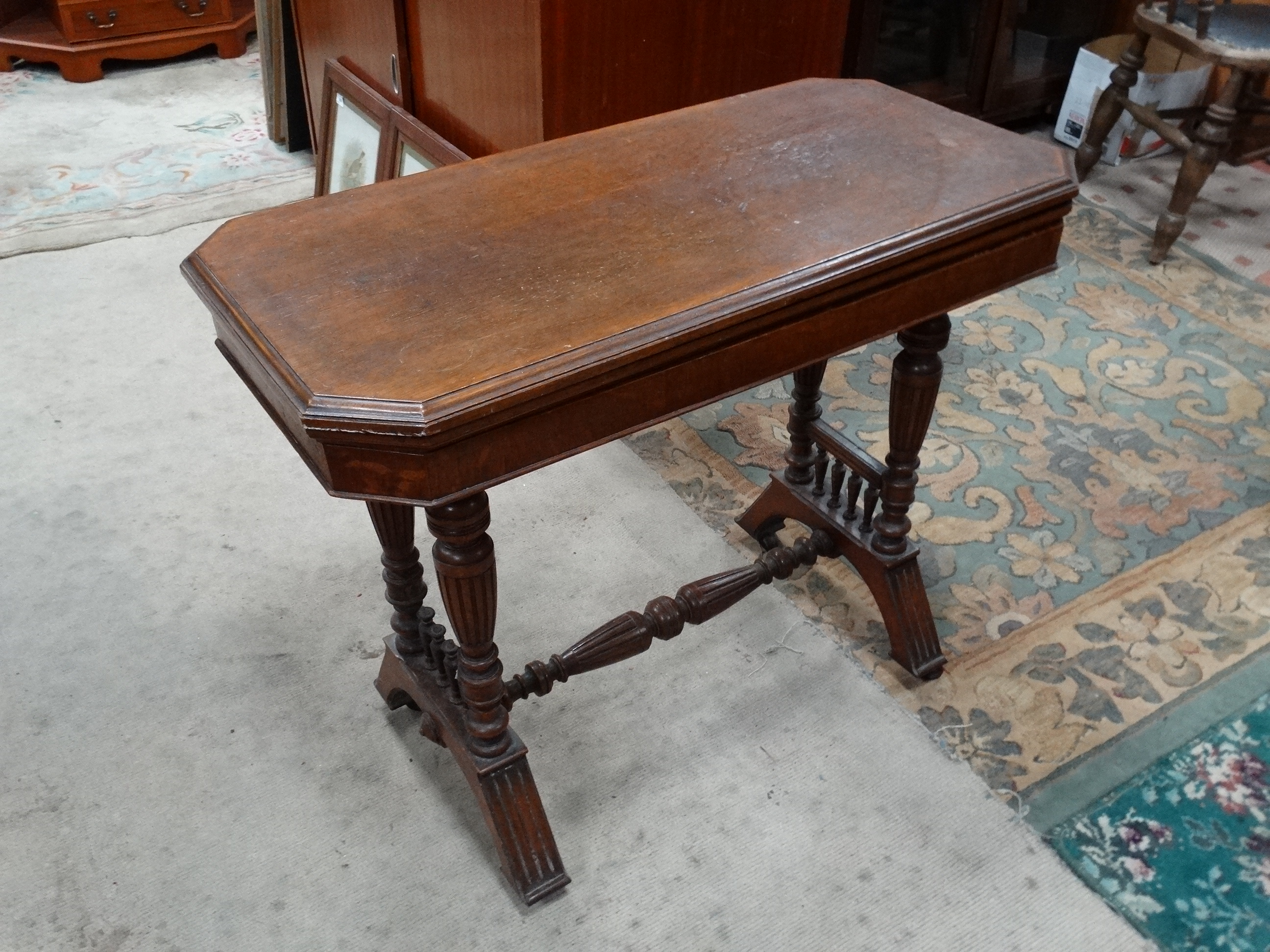 A Victorian stained oak card table with fold over and twist top and gold tooled burgundy leather - Image 5 of 5