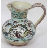 A Studio Pottery Jug , having foliate decoration and banded colour to base and neck,