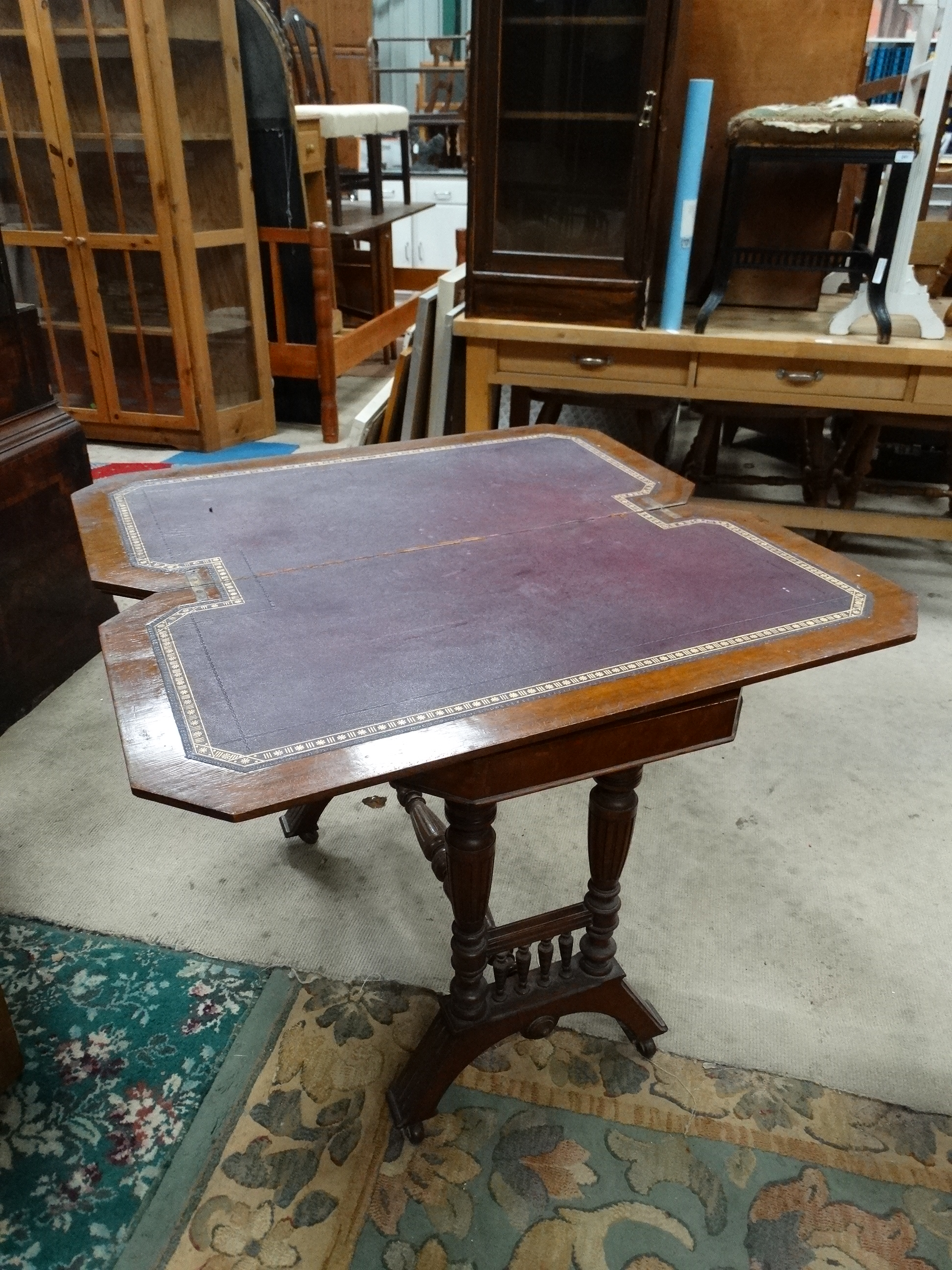 A Victorian stained oak card table with fold over and twist top and gold tooled burgundy leather - Image 2 of 5