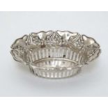 A silver bon bon dish with embossed and pierced decoration marked with RD no.