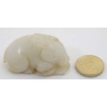 A Chinese pale jade figure of a recumbent rabbit 2 1/8" long CONDITION: Please Note