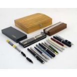 A collection of eighteen Fountain Ink and Ballpoint Pens and Propelling Pencils by Cross , Parker ,