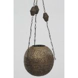 An Islamic pierced brass spherical pendant hanging shade CONDITION: Please Note -