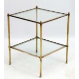 Mid-Century , Hollywood Regency : A two tier brass and glass with reeded legs ,