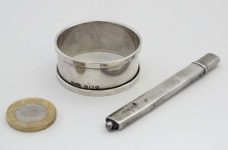 A silver pencil holder hallmarked Birmingham 1910 maker Francis Webb together with a silver napkin - Image 3 of 5