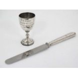 A silver miniature trophy cup hallmarked Birmingham 1949 maker Turner & Simpson Ltd together with