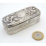 A cut glass dressing table box with silver top hallmarked Birmingham 1910 maker Henry Charles