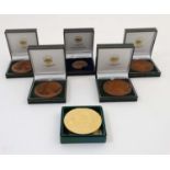 6 x cased medallions to include examples by the Tower Mint depicting Sheila and Richard