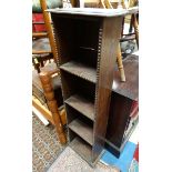 An 20thC stained oak bookcase of narrow form CONDITION: Please Note - we