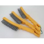 Three wire brushes with plastic handles CONDITION: Please Note - we do not make