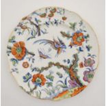 A 19thC English ''India'' stone china transfer printed plate with hand coloured details, decorated