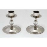 A pair of silver plate short candlesticks with facet cut glass knops 3 1/4" high