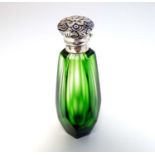 A green glass scent / perfume bottle with white metal top 3" high CONDITION: Please