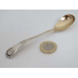 A Scottish silver queens pattern mustard spoon with gilded bowl. Hallmarked Edinburgh 1824 maker