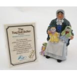 A 1983 Royal Doulton 'The Rag Doll Seller' Figure group, Pattern No. HN 2944. Modelled by Robert