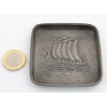 Decorative Metalware : Stept tinn Norway - A signed pewter pin dish decorated with image of a long