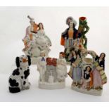 A collection of 5 items of Victorian Staffordshire pottery to include; A black and white