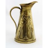 Decorative Metalware : Art nouveau - Joseph Sankey & Son - An embossed brass jug 8" high.