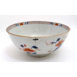 A Japanese Imari bowl decorated with birds in flowering boughs. 8'' diameter.