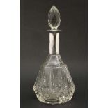 A large cut glass scent / perfume bottle with Continental silver collar marked .800 .