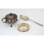 3 items of silver comprising a napkin ring with engine turned decoration hallmarked Birmingham 1932,