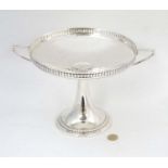 WMF : a large silver plate pedestal tazza with 2 handles , stamped ' WMF I/O ' ,