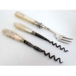 A small silver sweet meat fork hallmarked Sheffield 1899 with mother of pearl handle together with