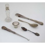 Assorted items to include a silver handled buttonhook and shoe horn, a scent bottle with silver