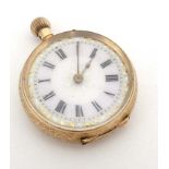 Gold cased pocketwatch : a 14k? ( mark rubbed) Gold cased ( chased decoration ) Top Wind ladies