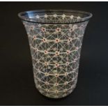 A Mid Century glass vase with retro floral and geometric decoration 7" high CONDITION: