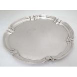 A silver plated salver CONDITION: Please Note - we do not make reference to the