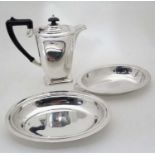 A silverplate Coffee pot and two silver plated entree dishes CONDITION: Please Note