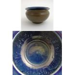 A Chinese bowl having brown glaze to exterior with cobalt blue interior with incised 5 clawed