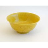 A Chinese Imperial yellow glazed, incised dragon bowl , decorated with 5 clawed dragon and phoenix ,