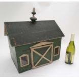 An early / mid 20thC Child's wooden green and cream painted toy Stable block / barn with two