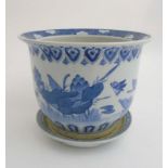 A blue and white Chinese ceramic planter/jardiniere decorated with birds,