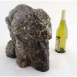 Architectural / Garden Salvage : a carved stone figure of a lizard mounted atop a human face ,